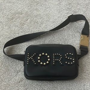 Like new Michael Kors black belt bag